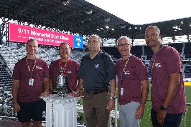 Cincinnati Fire Chief Steven Breitfelder, Cintas' John Amann, NFFF's John Granby, Todd Schneider, Nick Pickens, both from Cintas