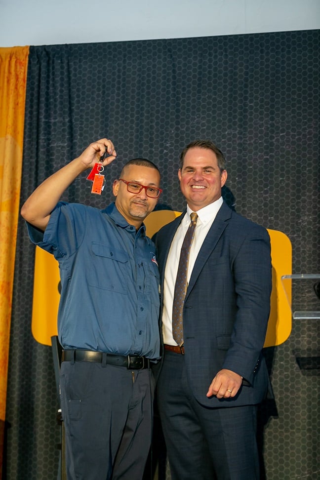 Steve Rosa (L) receives the keys to the new truck from Decatur, Ga., Cintas Rental GM Chris Wheeler
