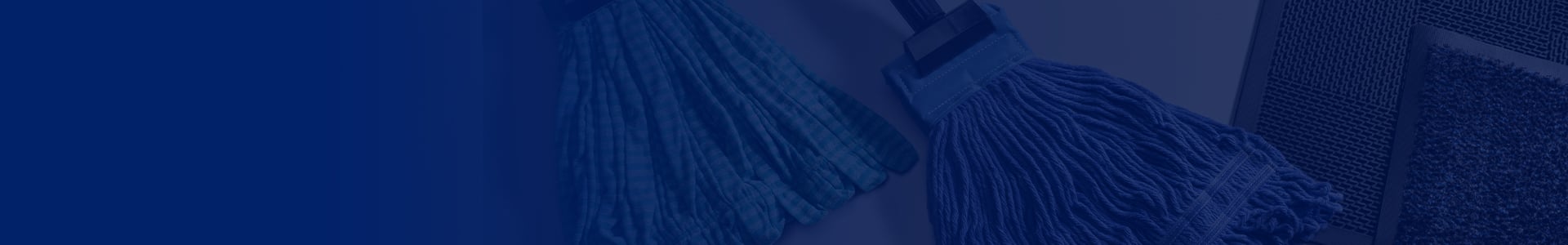 zoomed in image of floor mats and mops