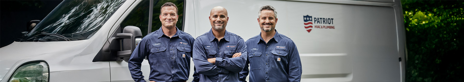 Three HVAC workers outfitted in Carhartt | Cintas