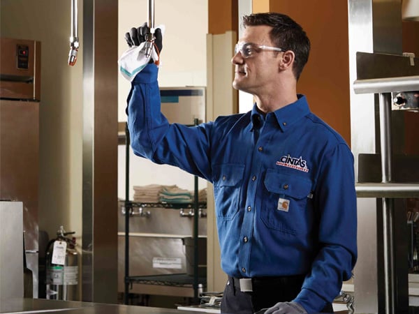 CintasFireProtectionRepresentativeinspectingsuppressionsystem